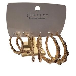 set of gold-toned bamboo-style hoop earrings